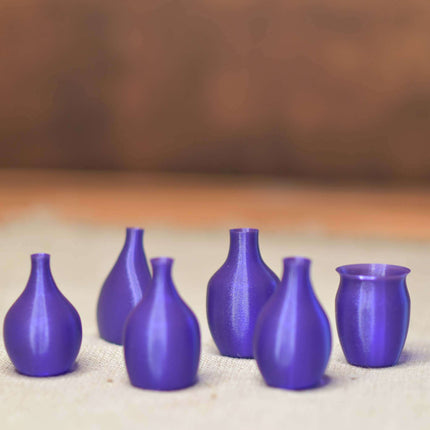 Sechs Mini Vasen Lila