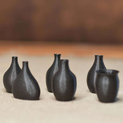 Sechs Minivasen Schwarz