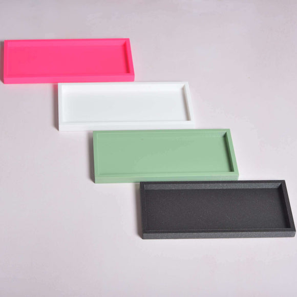 Tabletts in vier farben 3d rechteckig