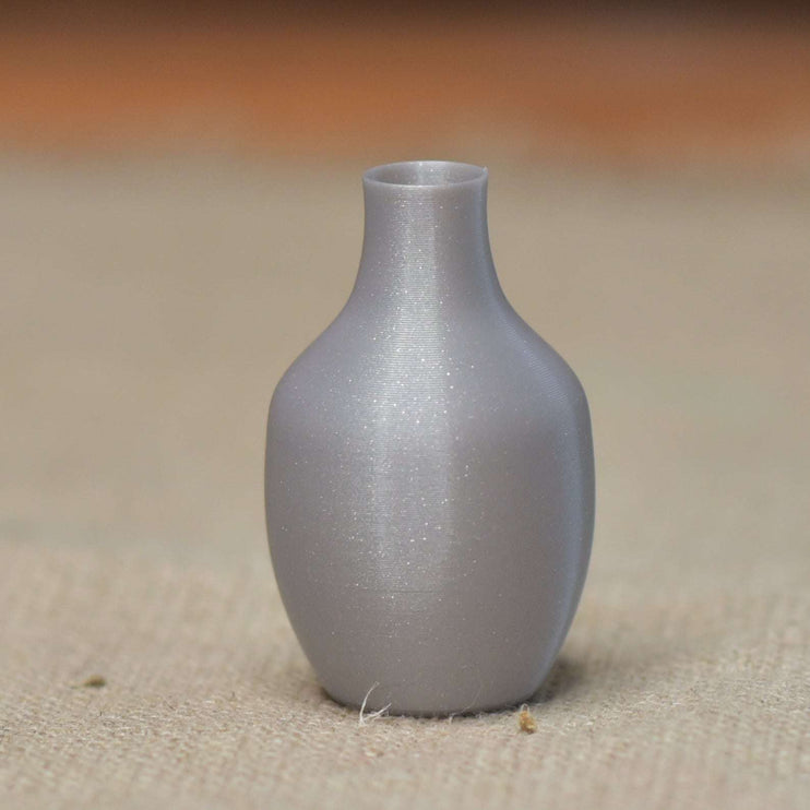 vase in grau